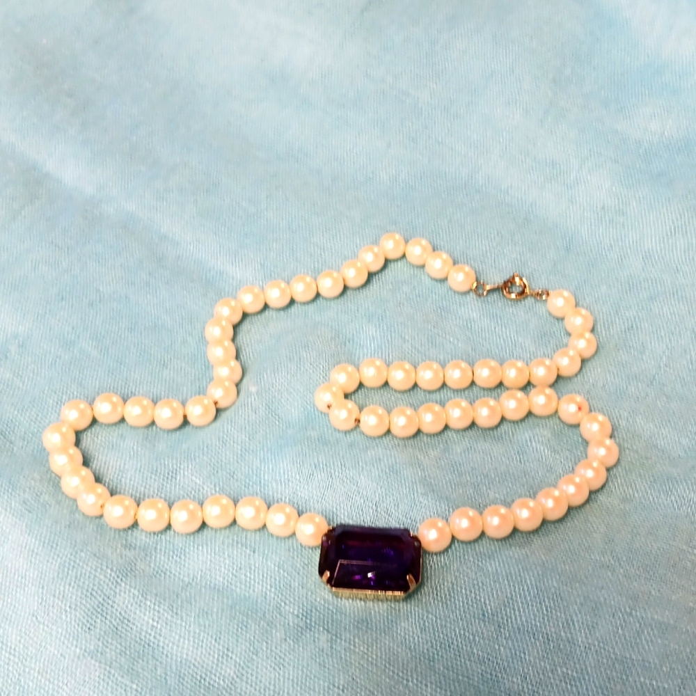 6.3.24 pearls on goldtone chain and purple stone